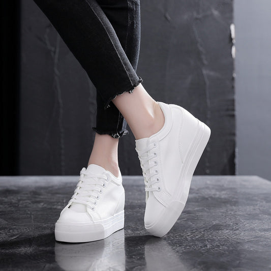 Soft Leather White Thick Bottom Height Increasing Insole Canvas Shoes Product information: Lining material: Microfiber Color: white, black Upper height: low top Heel shape: height increase insole Size: 34, 35, 36, 37, 38, 39 Sole craft: vulcanized shoes S